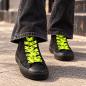 Preview: Flat neon yellow shoelaces with black skull pattern