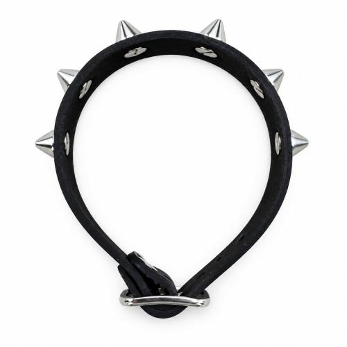 Spiked leather bracelet with conical studs and narrow wristband design