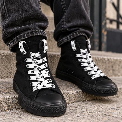 Flat white shoelaces with black skull pattern