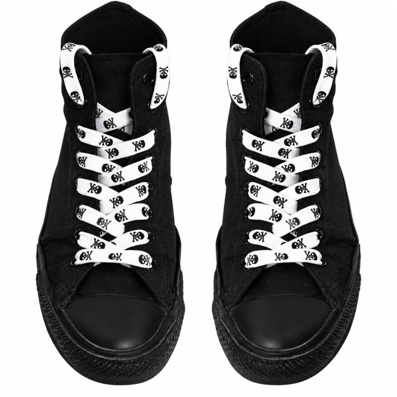 White skull print shoelaces on black high-top sneakers