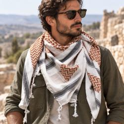 White brown black shemagh scarf worn around the neck in classic keffiyeh style