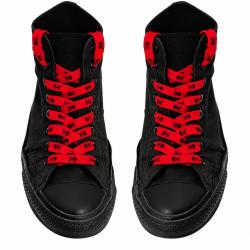 Red skull print shoelaces on black high-top sneakers