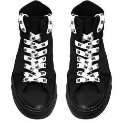 White skull print shoelaces on black high-top sneakers